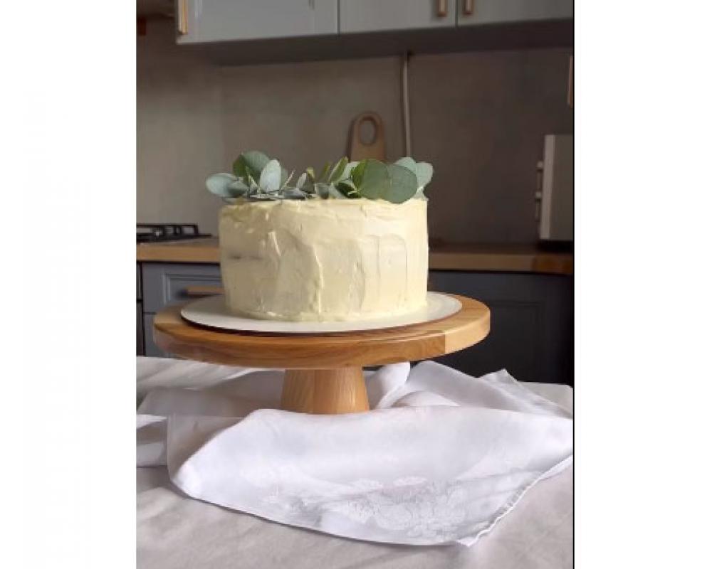 The cake stand is wooden